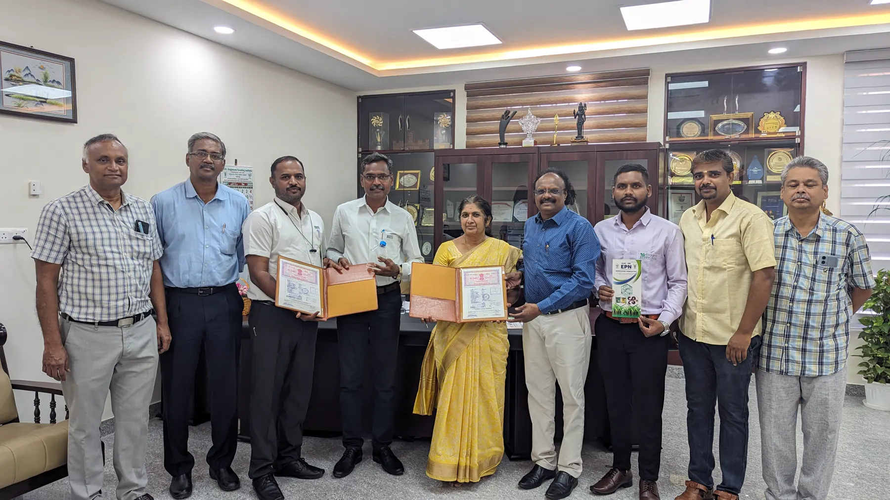 Bharti Green Tech and ICAR-Sugarcane Breeding Institute representatives holding technology-transfer documents in Coimbatore